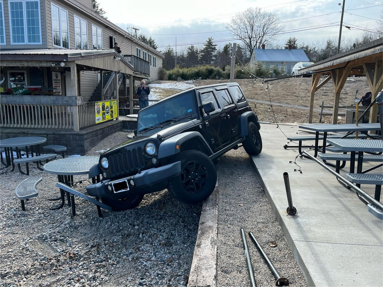 Whiting's winching a Jeep Wrangler off a ledge in New Hampshire